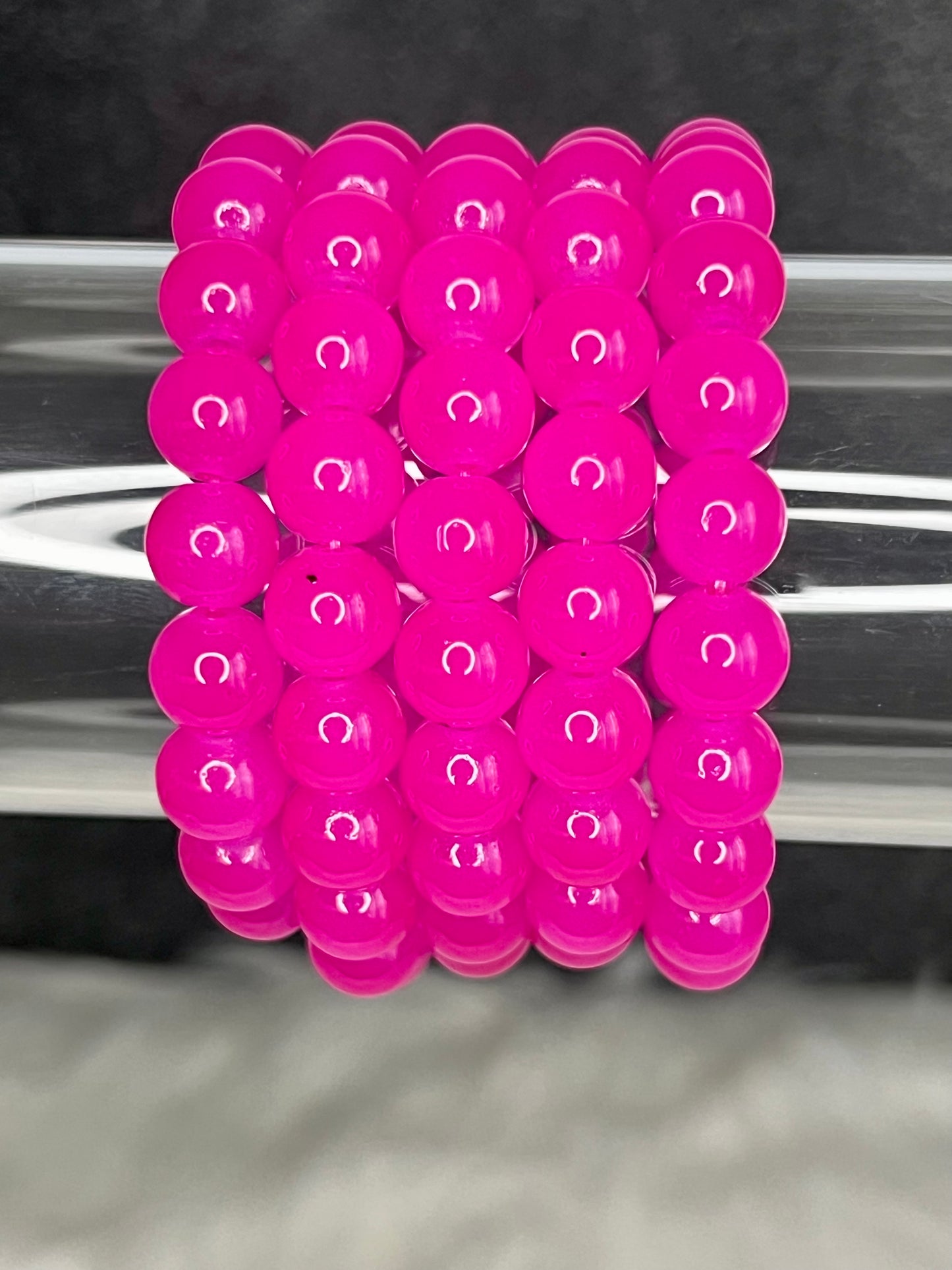 Pulsera de cuentas fucsia (1ud)